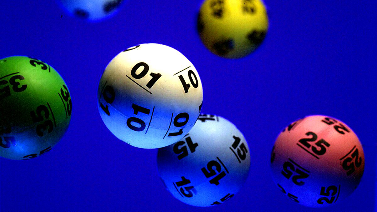 Hands holding lottery tickets